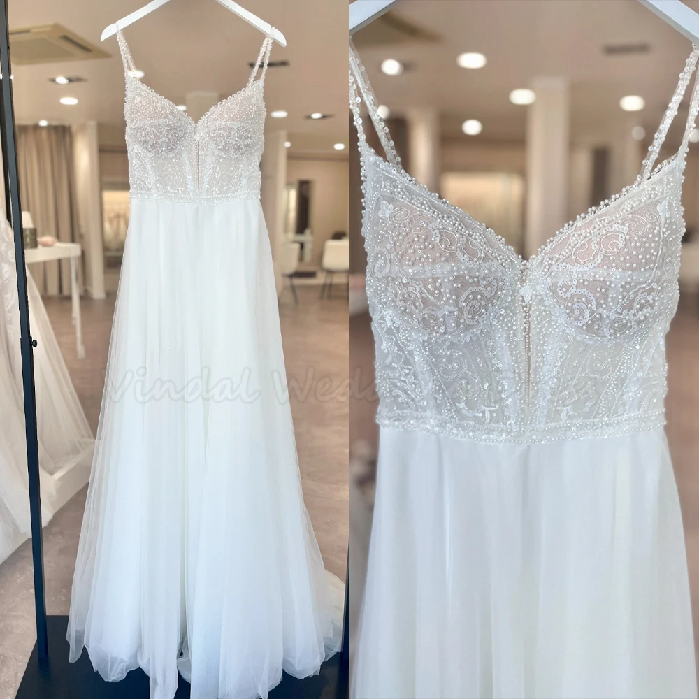 ชุดแต่งงานสายเดี่ยวประดับมุกหรูหราทรงเอไลน์ผ้าทูลล์ รุ่น Vindal Luxury Pearl Beading ปี 2026 สไตล์โบฮีเมียน สำหรับงานแต่งงานแบบเรียบง่าย สามารถสั่งตัดได้