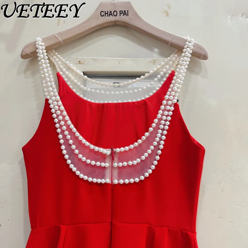 Europejska i amerykańska francuska gwiazda z temperamentem perłowa sukienka na szelkach letnie krótkie sukienki z wysokim stanem i odkrytymi plecami