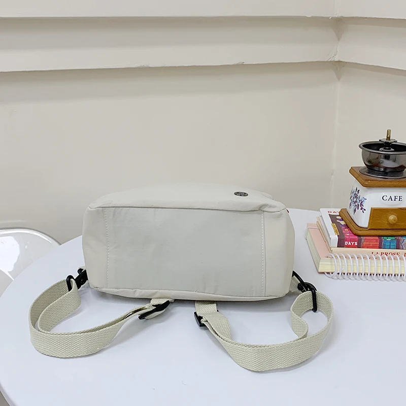 mochila-versatil-impermeavel-fena-2025-nova-primavera-verao-viagem-portatil-tecido-de-nylon-cor-pura-estilo-artistico-ret