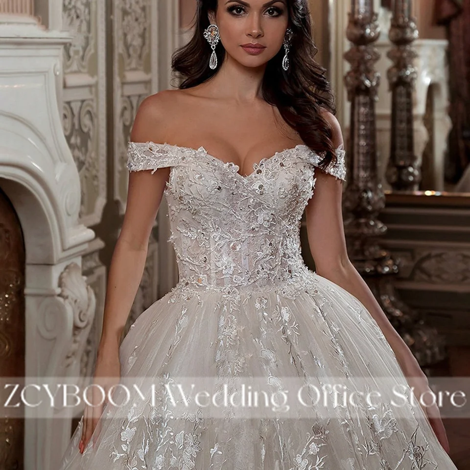 ชุดแต่งงานทรงบอลกาวน์แบบเปิดไหล่สีแชมเปญสุดหรู ปี 2022 คอวีประดับลูกไม้ผูกเชือกสไตล์เจ้าหญิง ชุดเจ้าสาว Vestidos De Novia