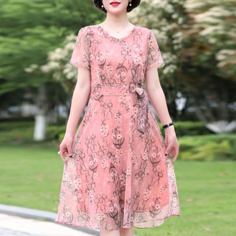 

2024 New Summer Commuting Elegant and Fashionable Loose Polyester Gauze Printed V-neck Lace Up Zipper Women's Mid Length Dress