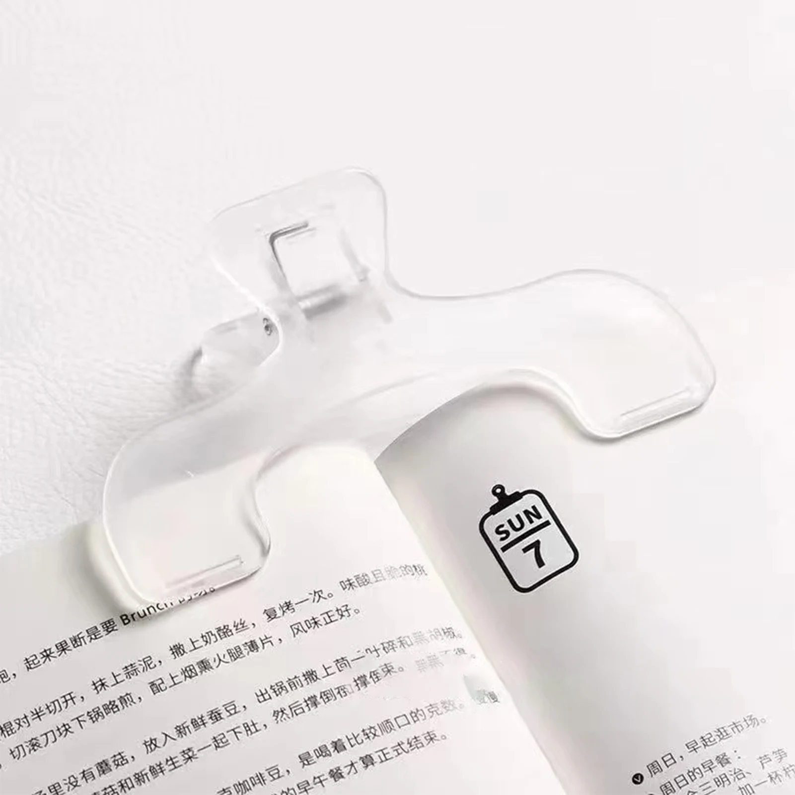 Anti-Slip Soft Pad Extra Large Clear Book Clip Plastic Page Holder - usage example