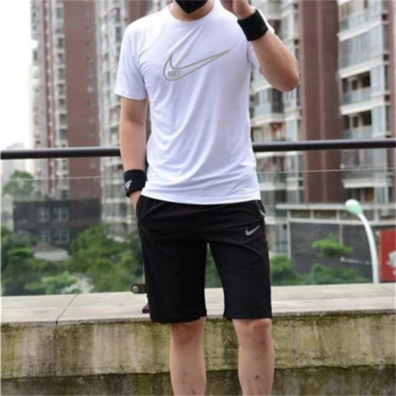 

Nike Sports Suit Men Comfortable Simple Short Sleeved and Shorts Near The Knees Suit Black and White