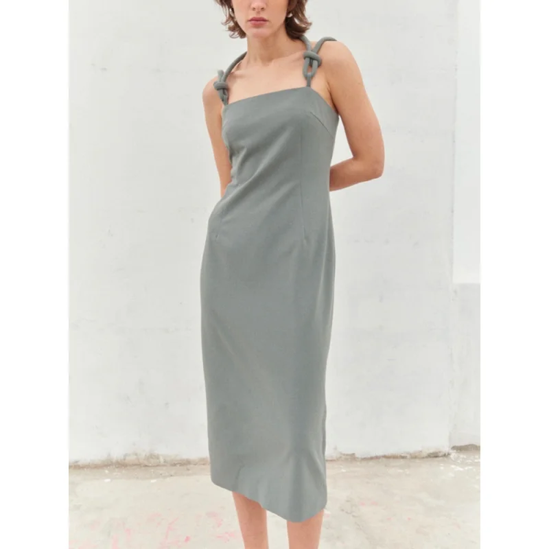 

Knot - tied halter sundress. New styles for spring - summer 2025. Casual solid - color mid - length sleeveless dress.