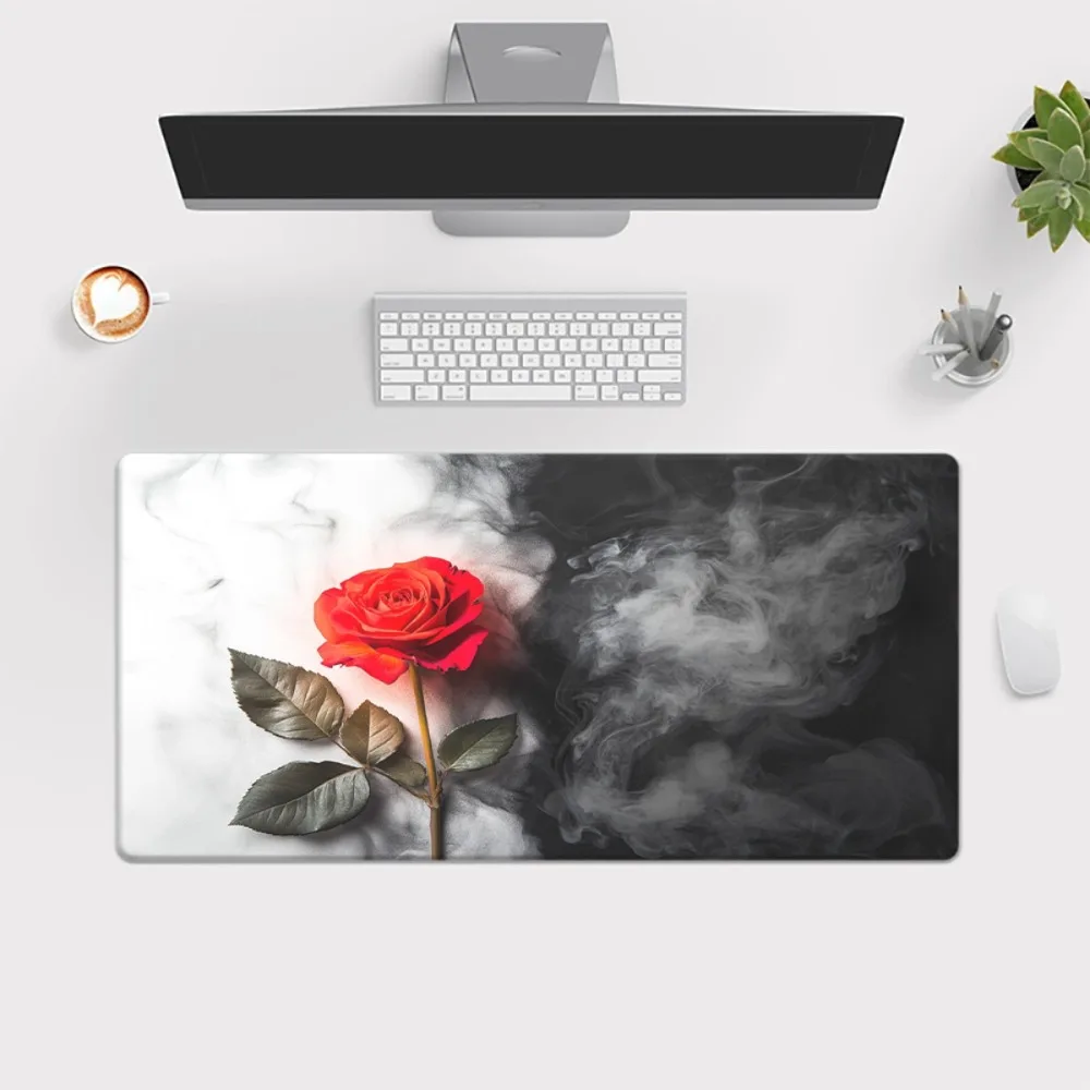 With red rose and smoke patterns, compatible with laptops, desktops, personal computers, and typing mats. Anti-slip mouse pad