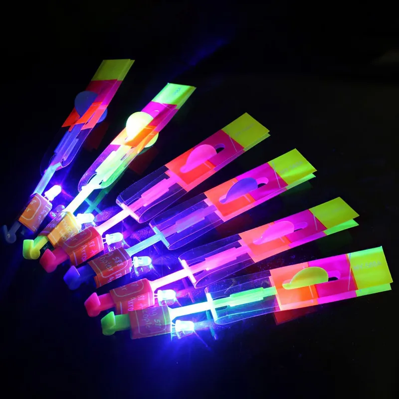 10PCS Outdoor Shining Rocket Flash LED Light Night Kids Luminous Slingshot Toys Slingshot Elastic Helicopter Rotating Toy Gift