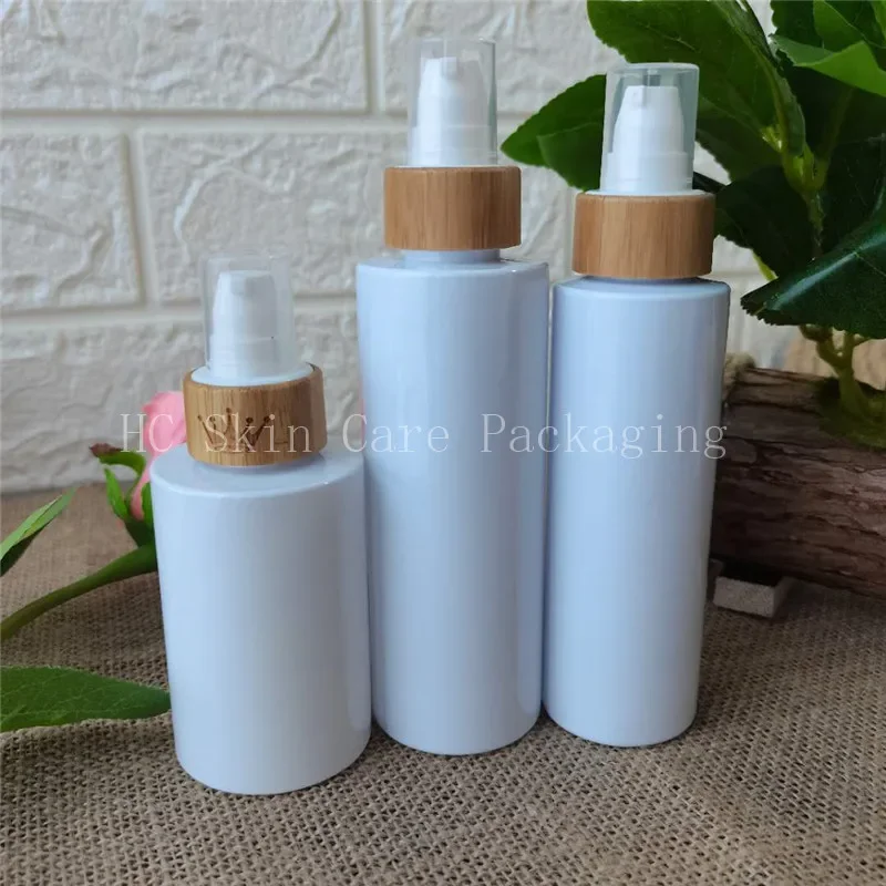 

sellingwhite plastic bottles with bamboo lotion cap, cosmetic packaging shampoo gel Liquid soap bottle，hand washing spressbottle