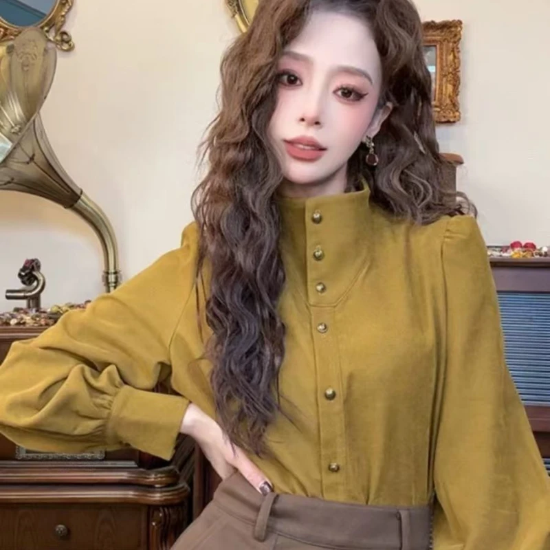 20224 香港スタイルのレトロな気質スタンドアップカラー秋の新スタイル長袖シャツデザインフレンチトップ女性服