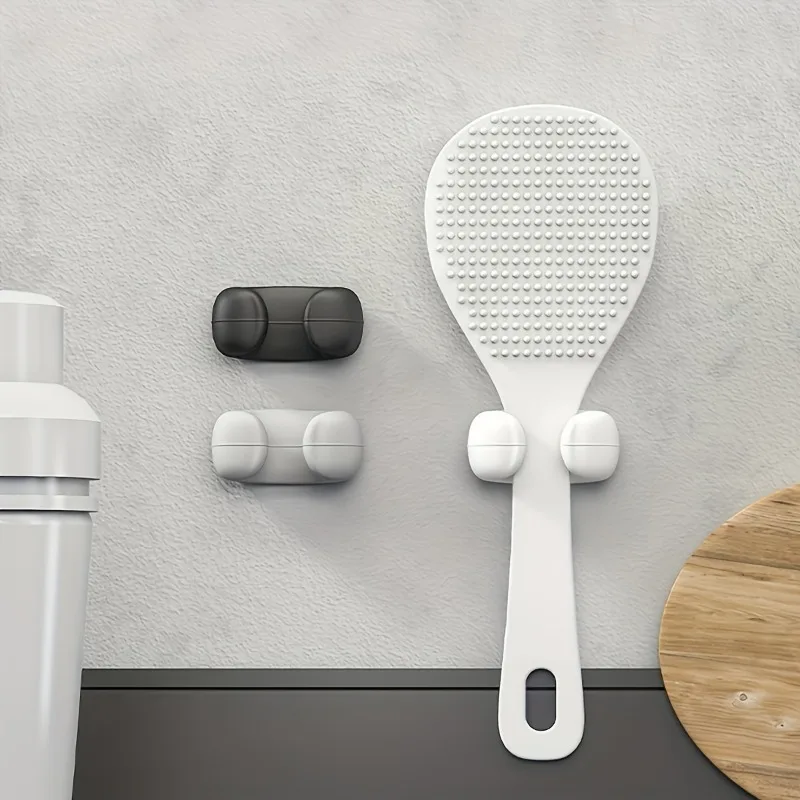1PC This rice spoon holder & organizer hook clip is a kitchen gadget specially designed for rice cookers.