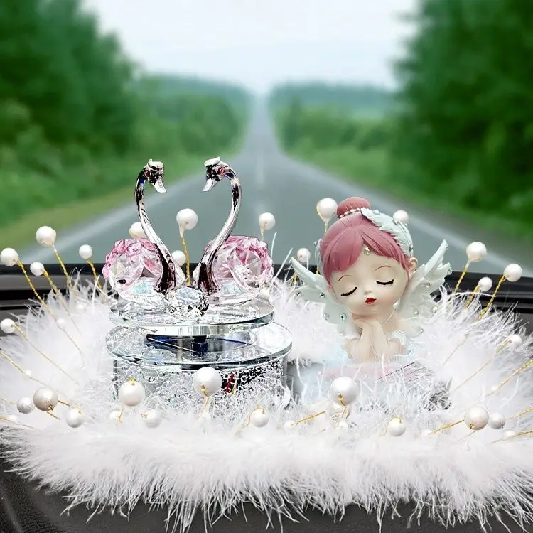 

Solar energy will move, rotating crystal swan car high-end perfume aromatherapy ornament, cute female car ornament in the car