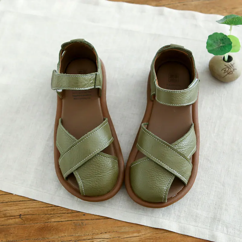 

Women's Roman Style Sandals Breathable Hollow out Design Flat Bottom Magic Tape Closure Leather Upgraded Synthetic Leather