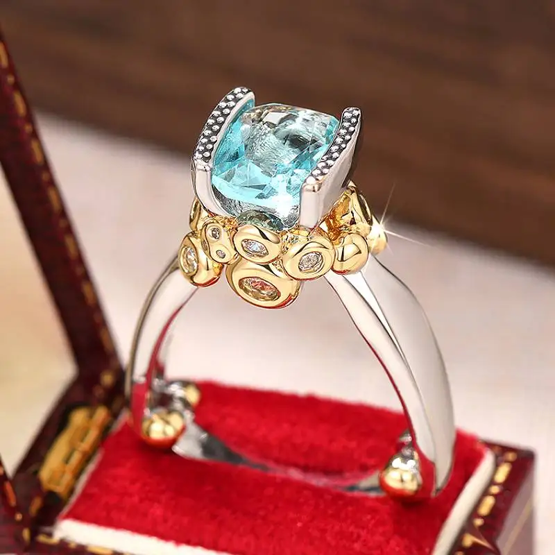 Huitan Zweifarbiger Damen-Ring, edle Hochzeit, Verlobung, schicke Accessoires, eingelegt, blau, glänzend, CZ, modische Persönlichkeit, geometrischer Schmuck