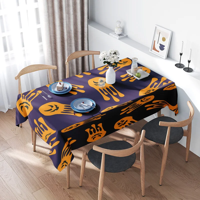 

Halloween-themed tablecloth with pumpkin pattern, suitable for holiday dinner decoration purple and yellow color scheme included