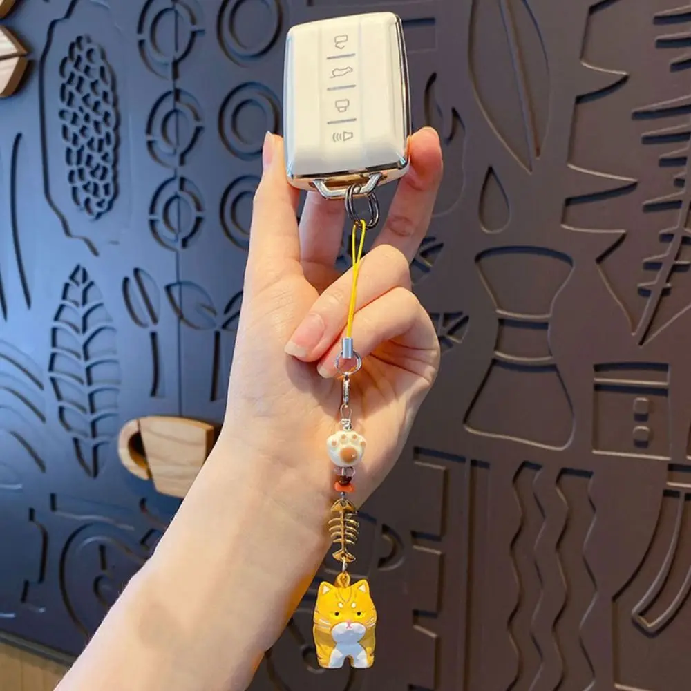 2 pçs moda pata contas gato espinha de peixe chaveiro saco pendurado bonito carro chaveiro ornamentos telefone cordão chave decoração