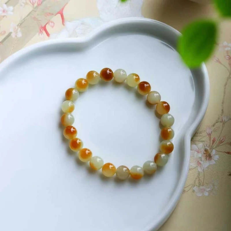 

Натуральный нефрит Хэтянь из Цемуо, старый материал с красивым сахарным оттенком, круглый и гладкий браслет из жадеита.