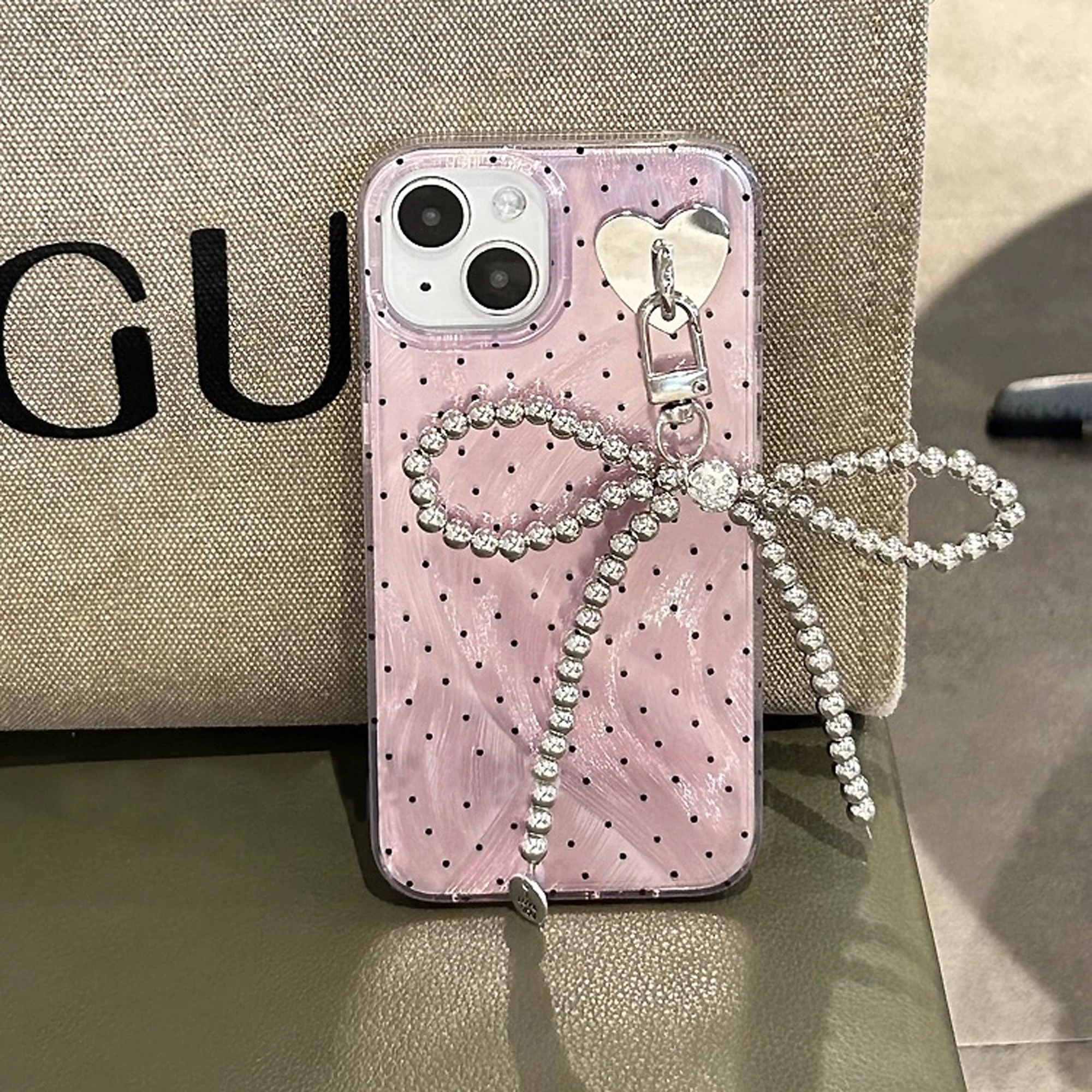 The new colorful polka-dot phone case with chain is suitable for iPhone 15 14 13 12 11 all-inclusive shock-proof girl phone case