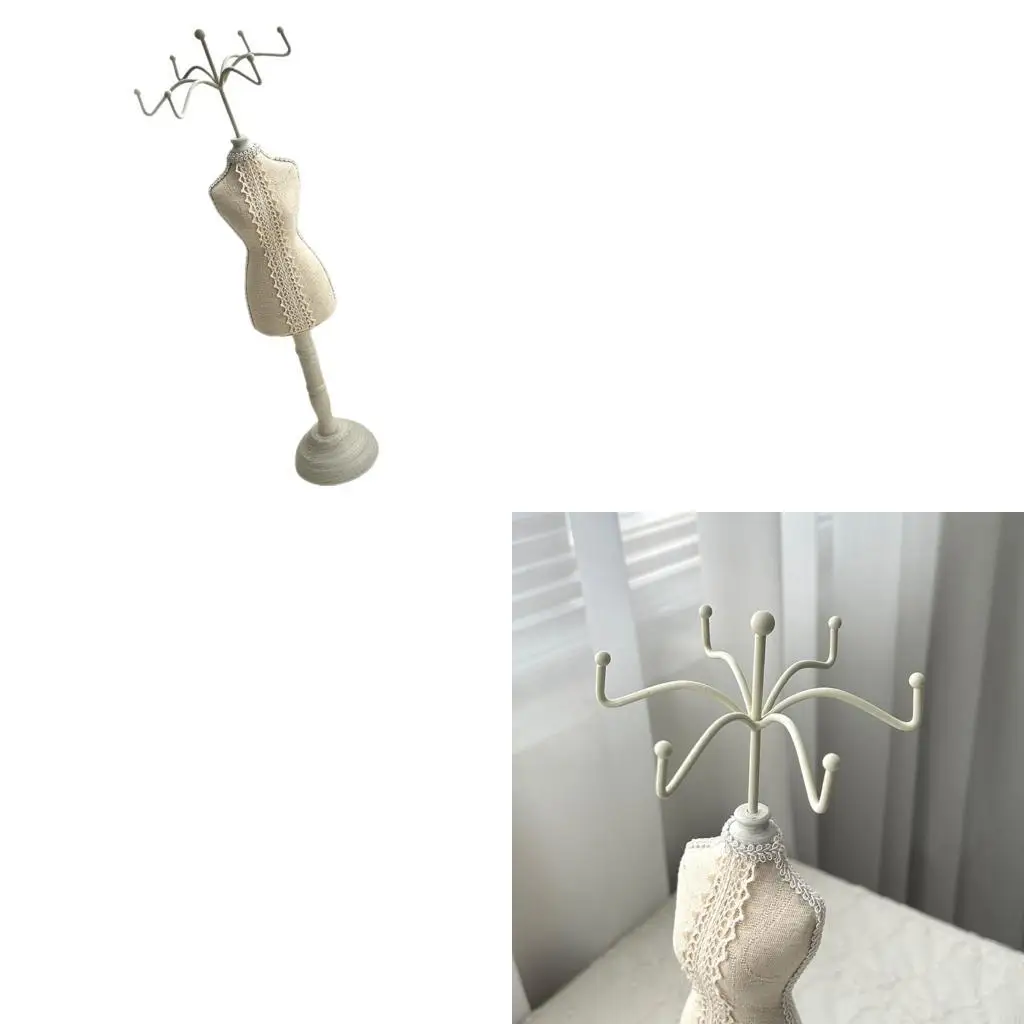 

Нежный белый шнурок украсил деревянную выставочную стойку ювелирных изделий для дисплеев свадебного магазина