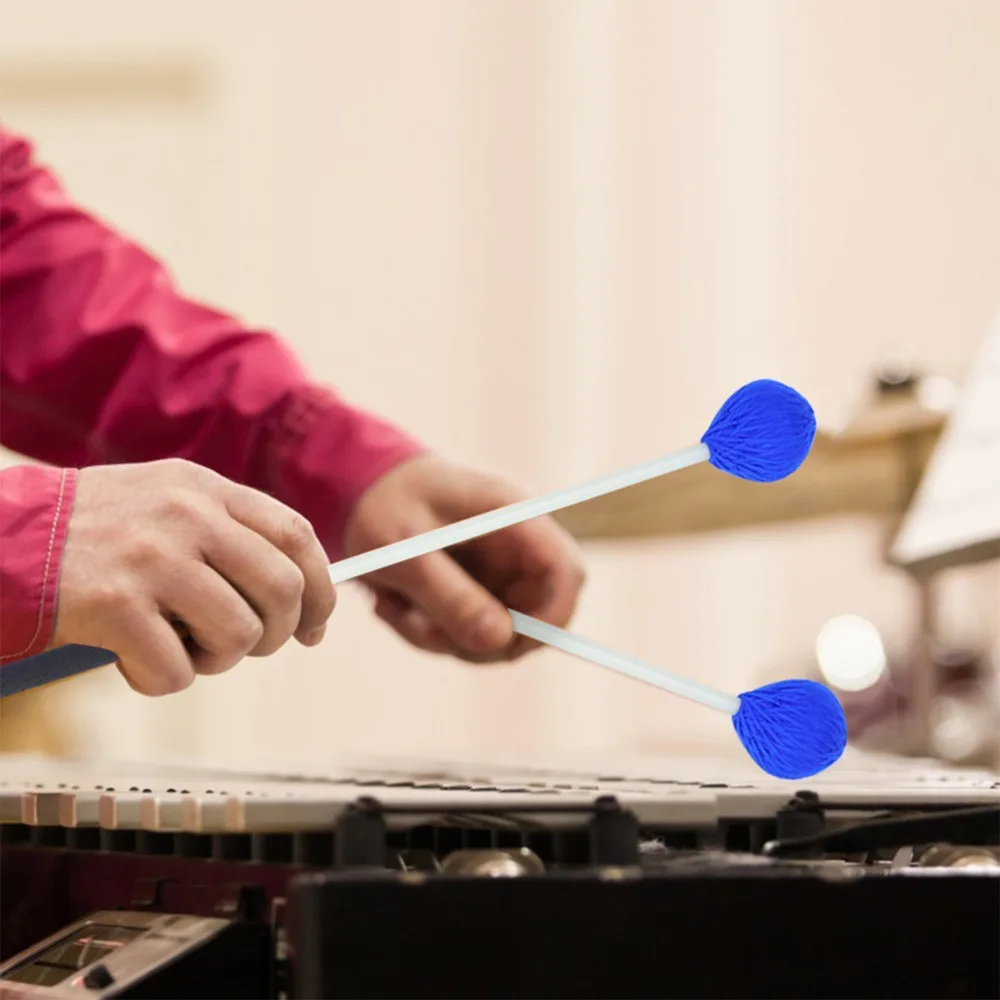 ​ ​ Manijas de Fibra de Vidrio ​   Baquetas de marimba con cabeza de hilo ​ ​ Ligero ​ 14.2 * 1.4 pulgadas ​ Baquetas para Vibrafono ​ ​ Azul