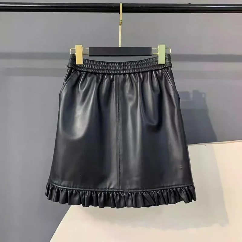 กระโปรงหนัง PU ทรงเอ สไตล์มินิ สำหรับผู้หญิง รุ่นใหม่ประจำฤดูใบไม้ผลิ เอวสูง ทรงหลวม ชายกระโปรงทรงสวยทันสมัย  กระโปรงทรงเอ  กระโปรงยอดนิยม