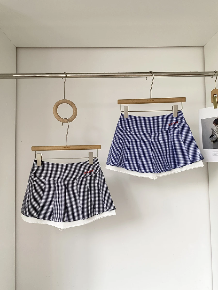 

Новая летняя короткая юбка в корейском стиле 2025 года: молодежная, универсальная, в клетку, плиссированная, с высокой талией, из полиэстера