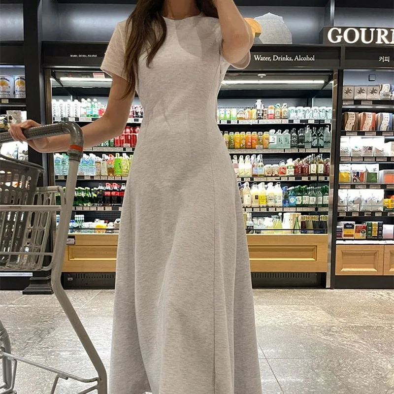 Été nouveau Sle ort Sve Bal tricoté T-shirt Dr femmes sur le genou longue a-ligne minceur Ele jupe à la mode