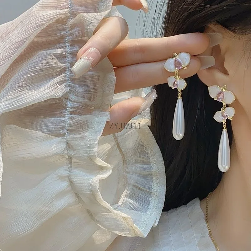 Retro nieuwe Chinese high-end gevoel unieke emaille druppelglazuur roze lange franjes pareloorbellen oorclip oorbellen