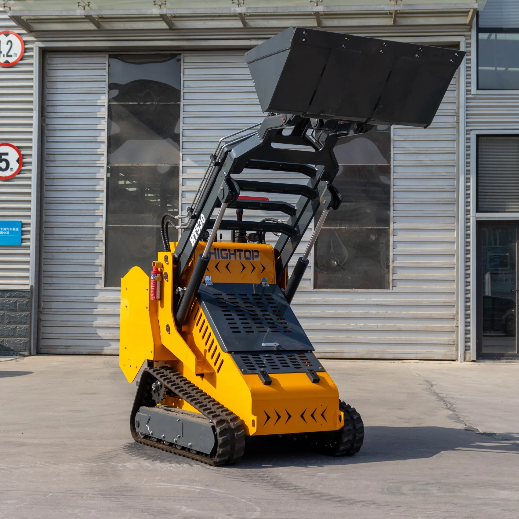 Dostosowany, wielofunkcyjny (4 w 1) ładowarka odkładająca koła, z napędem diesla, na gąsienicach, dostępna w magazynie w USA.