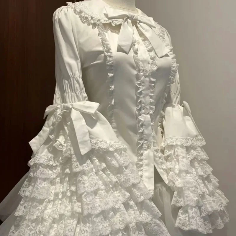 

Женская блузка в стиле Лолиты Y2k, готический воротник Питера Пэна, кружевной бант, оборки, топы, милые рубашки большого размера с расклешенными рукавами JSK, белые блузки