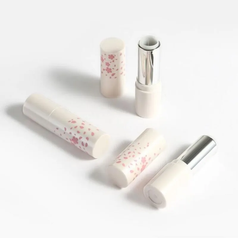 

Wholesale Lipstick Empty Tube With Porcelain White Small Flower Lipstick Package 12.1mm Diameter