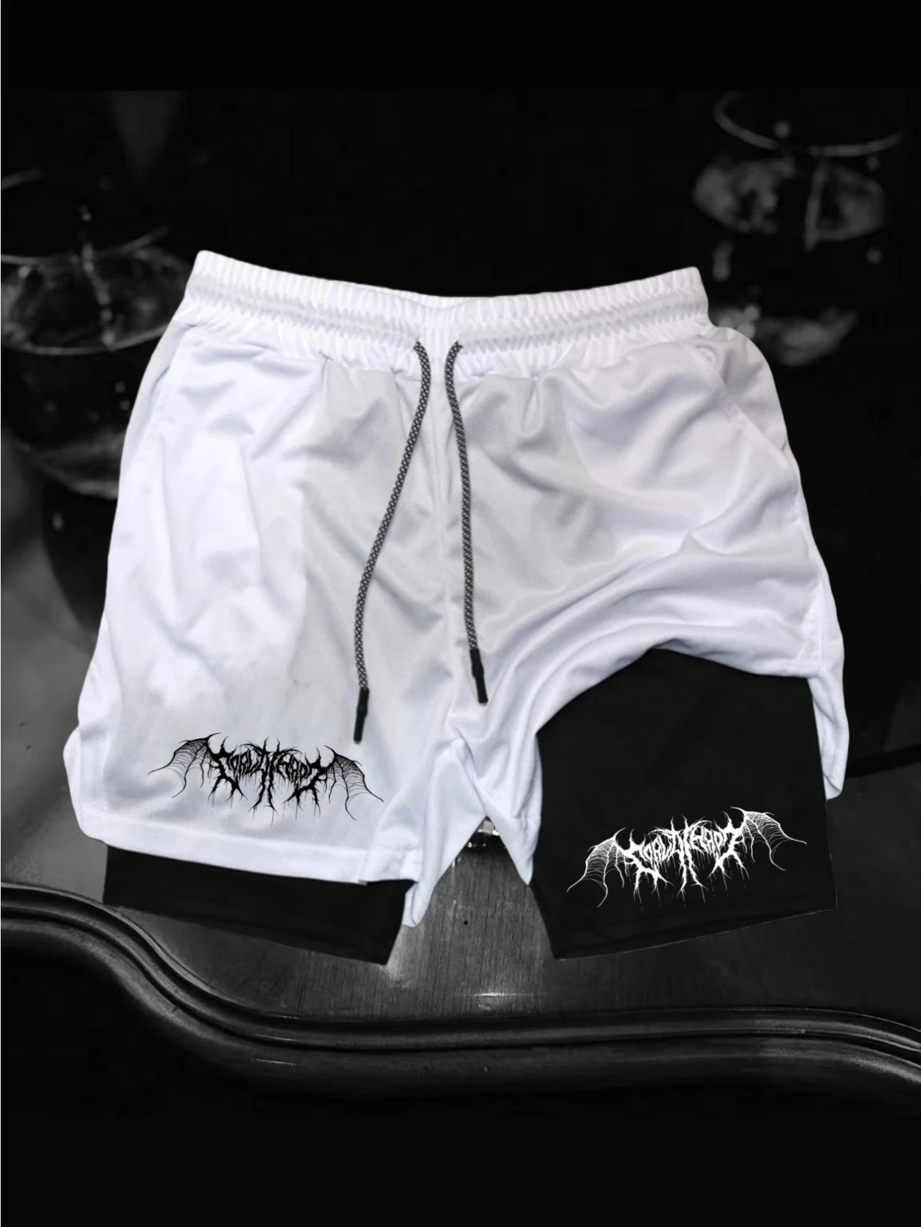 Men's casual style, deep black metal texture, bat thorn font print, street style