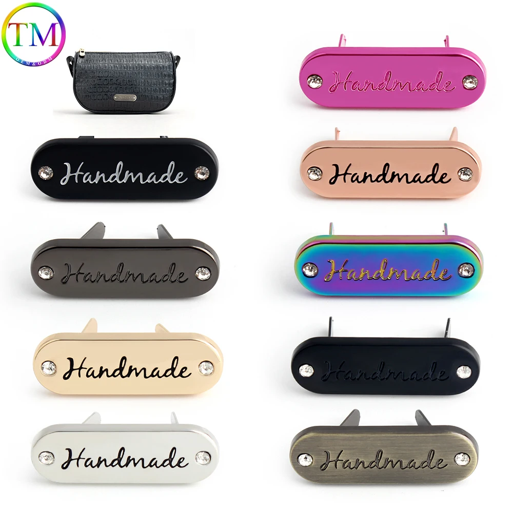 

20-60PCS 35x12mm Metal Label Tags with Diamond Engraved Brand logo For Handbag Purse Shoes Scarf DIY Leather Craft Accessories