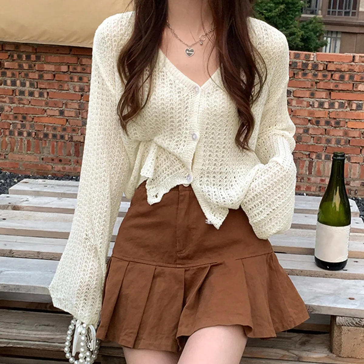 

Korean Chic Pure Color Thin European and American Lazy Style Loose Cut Out Ice Silk Sun Protection Cardigan Sweater