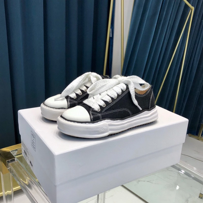 أحذية قماشية عالية الجودة للرجال والنساء مصممة أحذية مفلكنة أحذية تزلج في الشوارع أحذية رياضية مريحة ومتينة للاستخدام في الهواء الطلق #1