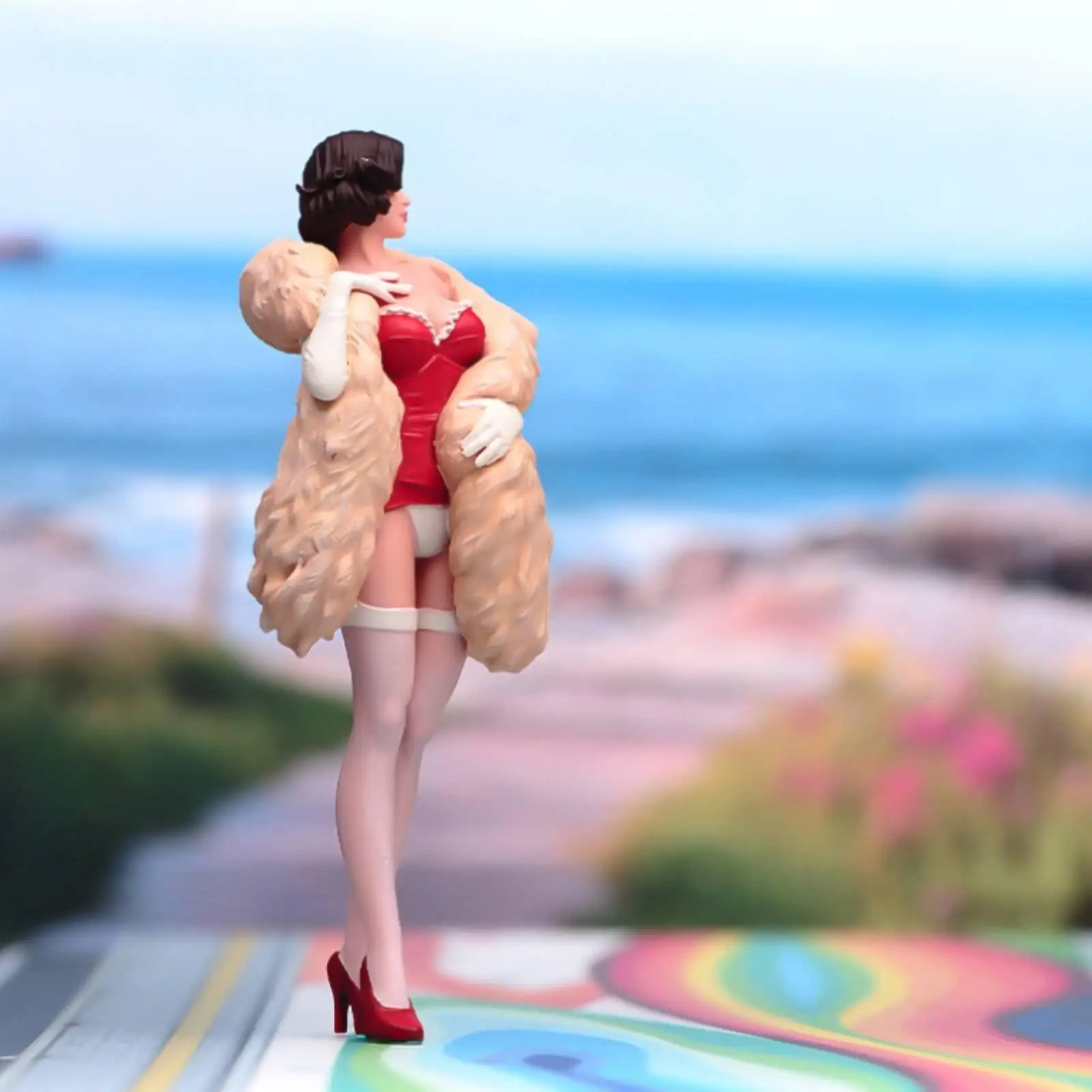 Highly detailed miniature female figurine, diorama model, pose
