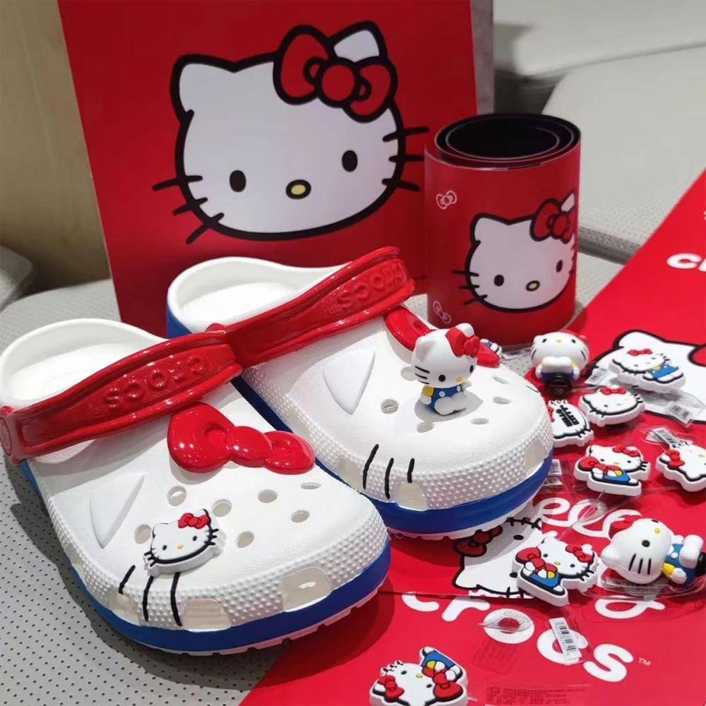Neue Sommer 2026 Sanrio Hello Kitty Cartoon Anime Niedliche Rote Schleife Hochwertige Damen Weiße Modische Strand-Sandalen mit Hohem Absatz