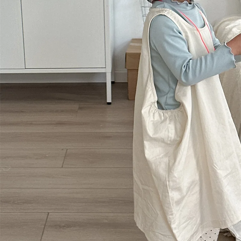 تنورة سترة مكدسة بجيب للفتيات للربيع والخريف منتج جديد ملابس أطفال فستان بسيط بلون واحد للأطفال