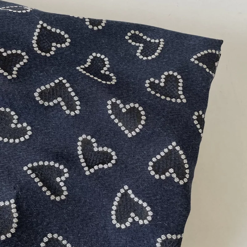 Exquisite denim blue knitted heart-shaped jacquard polyester clothing fabric handmade DIY