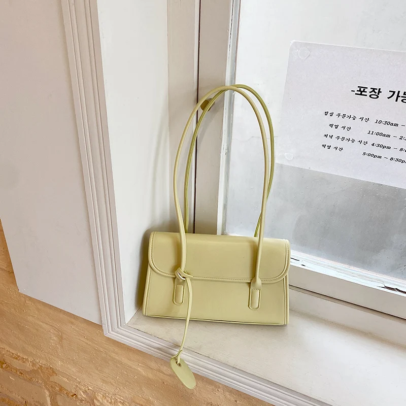 Yellow Shoulder Underarm Bag Women 2024 Spring/Summer New Fashionable French Texture PU Shoulder Bag Elegant pendants Handbag
