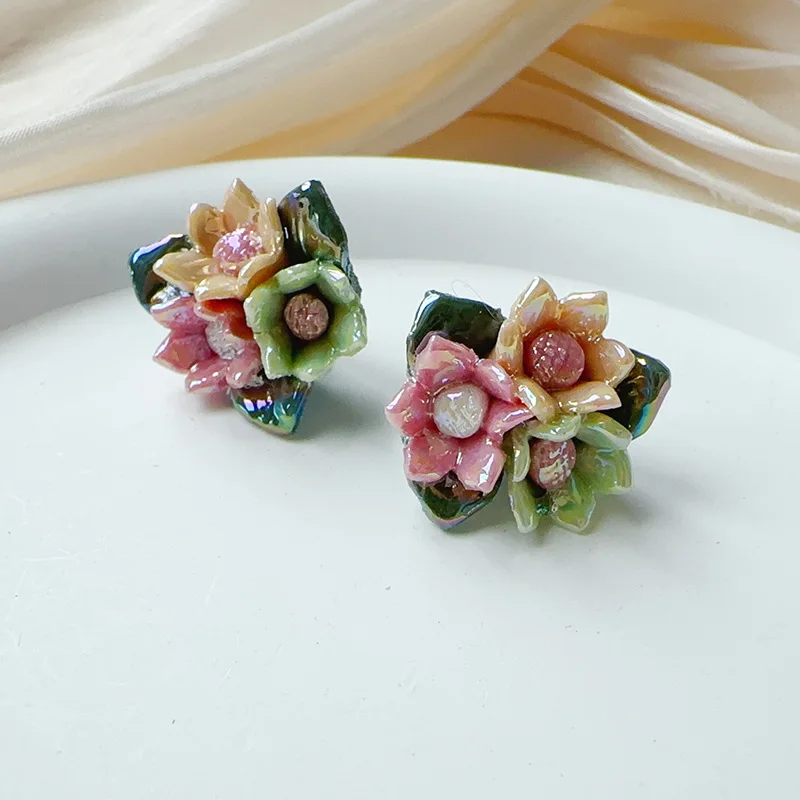 Forest-style fresh three-dimensional triangle three-color ceramic flower earrings