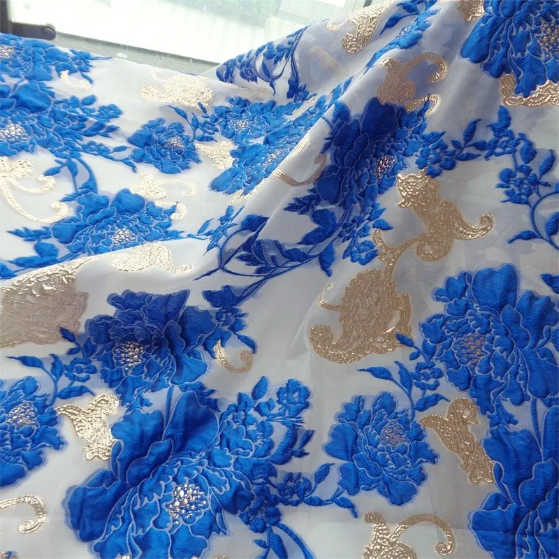 

Three-dimensional semi-transparent organza jacquard cut fabric silky slightly stiff gold thread floral