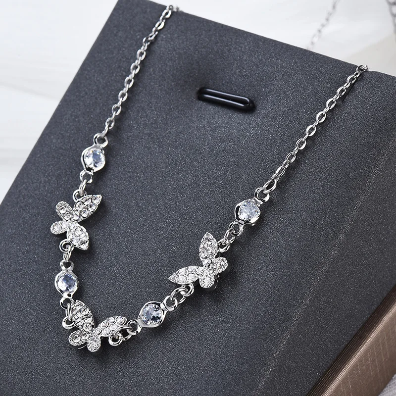 

A brand-new simple three-butterfly single-layer collarbone chain necklace exudes a sweet feminine charm