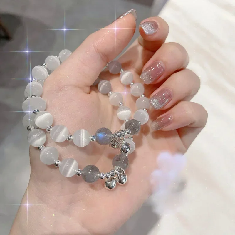 

Cat eye bell natural strawberry crystal DIY boudoir bracelet women blue sand stone imitation gray moonlight crystal wholesale CN