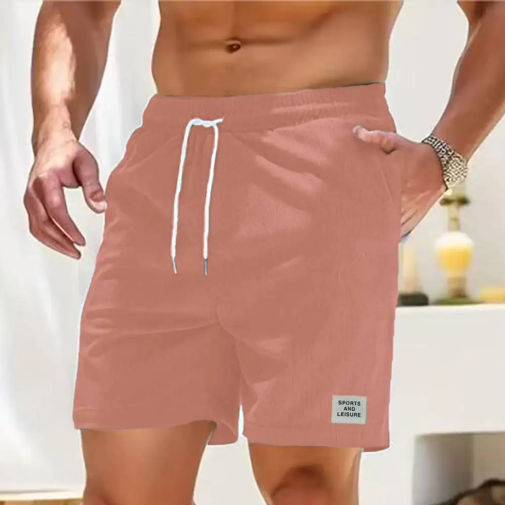 Pantaloni della tuta estivi nuovi pantaloni corti in velluto a coste con lacci pantaloncini da uomo semplici pantaloni a righe atletiche Casual