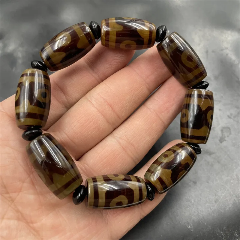 Vintage distressed bright brown three-eye dzi agate bracelet with tube beads