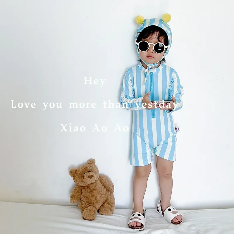 Baby girl swimwear   costume boys and girls summer 2024 new one-piece cute baby long-sleeved swimsuit sunscreen quick dry