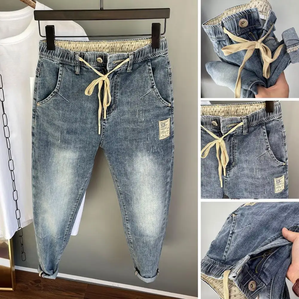 Jeans harém estilo hip-hop masculino, elástico na cintura, cordão ajustável, calças jeans com zíper, bolsos para um