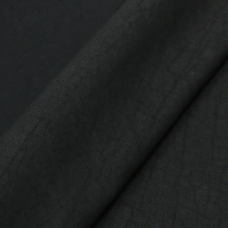 실크 플레인 새틴에 크랙 패턴이 있는 무형문화유산 샹윤사 원단은 치파오 의류에 사용됩니다.