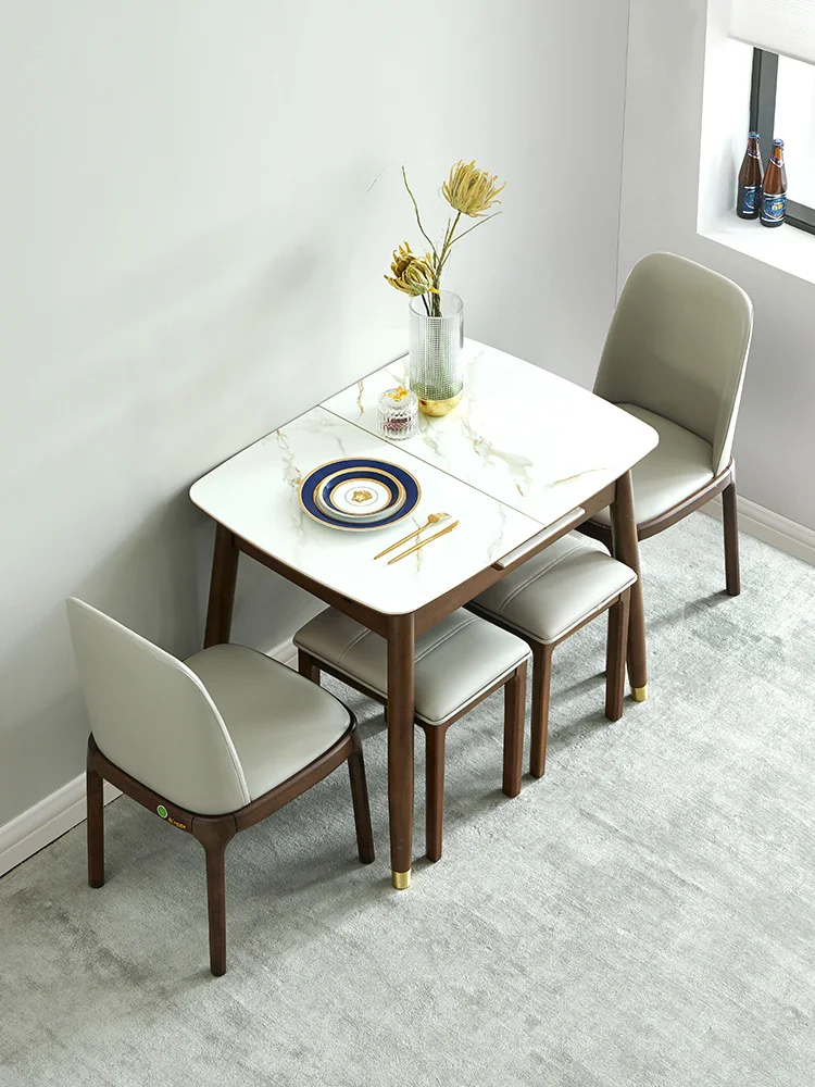 

Small apartment dining table retractable household solid wood light luxury space dining table rock slab foldable Nordic wall