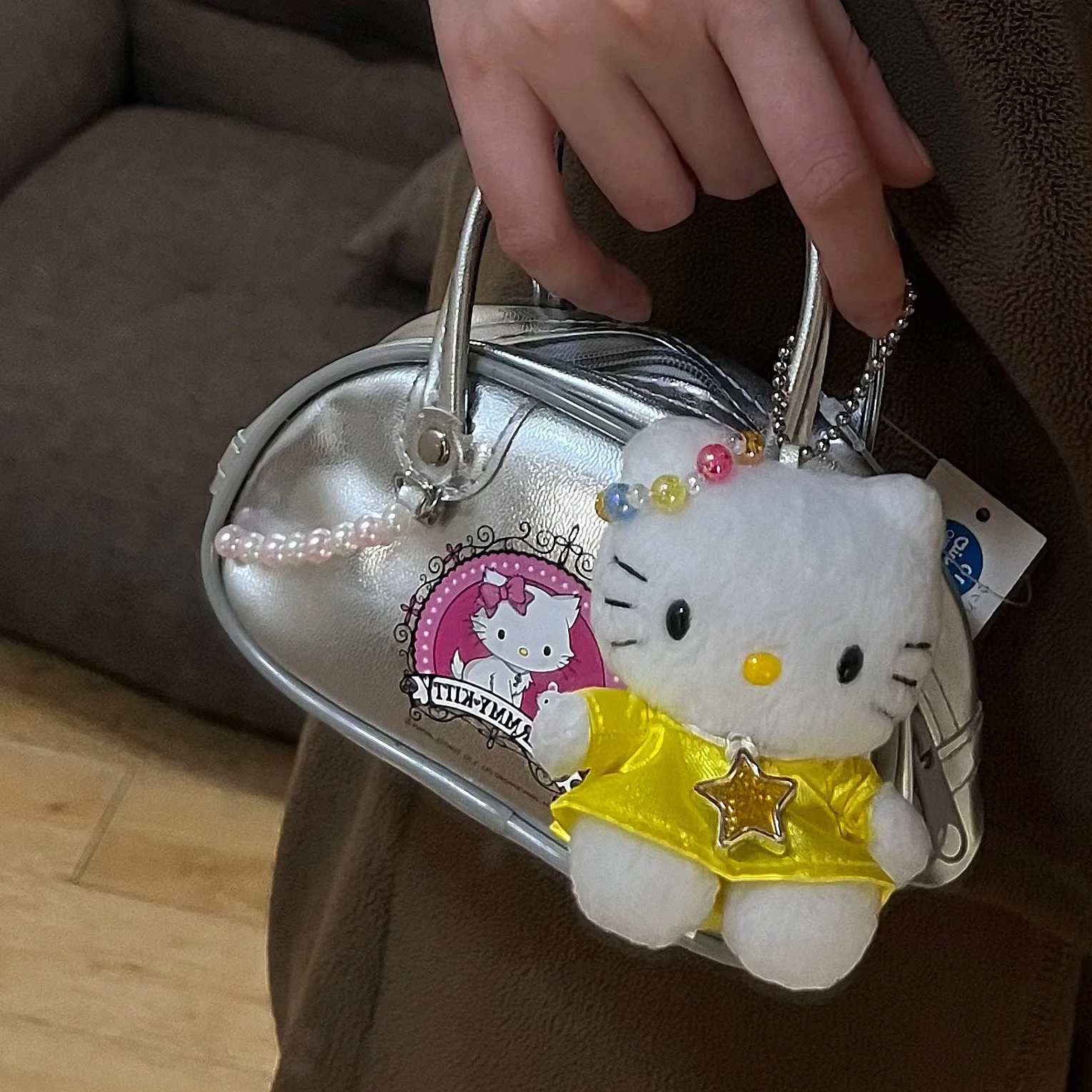 กระเป๋าถือ minio Hello Kitty กระเป๋าใต้วงแขน2023ใหม่ฤดูใบไม้ผลิและฤดูร้อนกระเป๋าสะพายข้างอเนกประสงค์กระเป๋าสะพายไหล่