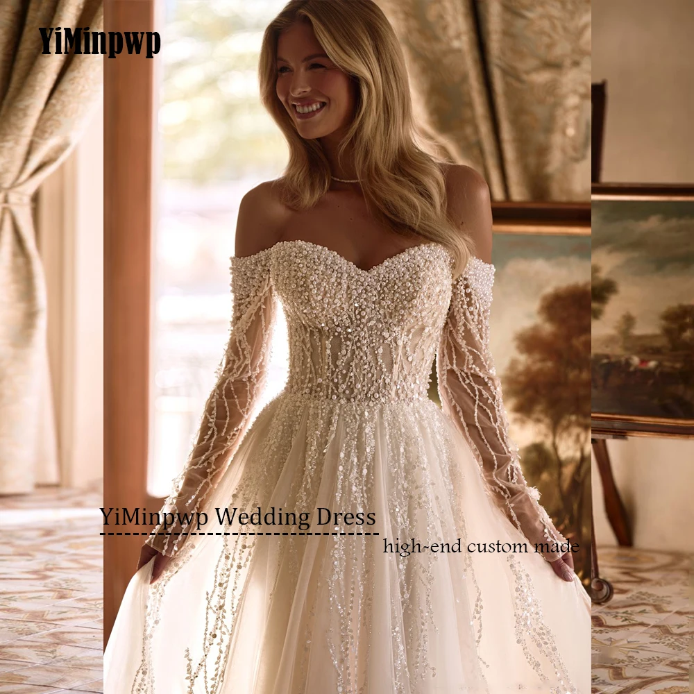 Abiti da sposa con perline personalizzati 2025 Abito da sposa di lusso a maniche lunghe con scollo a cuore senza schienale Abito da sposa principessa A-Line in tulleAbiti da sposa personalizzati a perline 2025 lusso ma